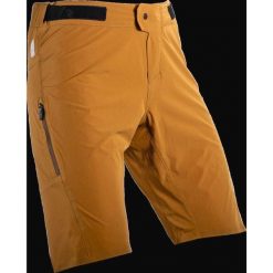 Spodenki rowerowe (+spodenki kolarskie z pampersem w zestawie) LEATT Shorts MTB. Brązowe szorty męskie LEATT, bez wzorów, sportowe. W wyprzedaży za 314.10 zł.
