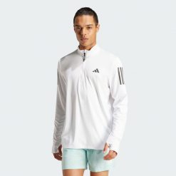 Bluza Own The Run Half-Zip. Niebieskie bluzy bez kaptura męskie Adidas, m. Za 219.00 zł.