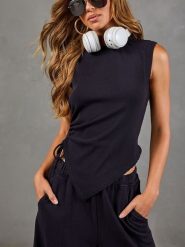 Milan Kiss Top w kolorze czarnym rozmiar: S. Czarne topy damskie Milan Kiss, s, bez wzorów, bez kołnierzyka. Za 174.95 zł.