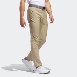 Spodnie do golfa męskie ADIDADS. Spodnie materiałowe męskie Adidas, bez wzorów, sportowe. W wyprzedaży za 189.99 zł.