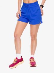 Spodenki do biegania damskie Odlo Zeroweight 4 Inch Short. Niebieskie szorty damskie Odlo, bez wzorów, z materiału, z podwyższonym stanem. Za 230.99 zł.