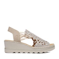 Sandały Rieker. Brązowe sandały damskie Rieker, bez wzorów, bez obcasa, na koturnie. Za 319.99 zł.