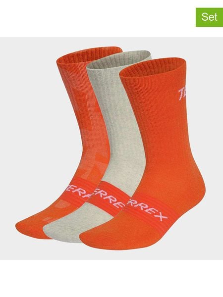 Adidas Skarpety (3 pary) w kolorze pomarańczowo-beżowym rozmiar: L. Pomarańczowe skarpetki męskie Adidas, bez wzorów. Za 73.95 zł.