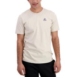 T-shirt Le Coq Sportif Model Ess Te Ss N Kolor Beżowy. Brązowe t-shirty męskie Le Coq Sportif, m, bez wzorów, z tkaniny, bez kołnierzyka. Za 192.50 zł.