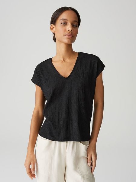 OPUS Koszulka w kolorze czarnym rozmiar: 36. Czarne bluzki damskie Opus, bez wzorów, bez kołnierzyka, bez ramiączek. Za 86.99 zł.