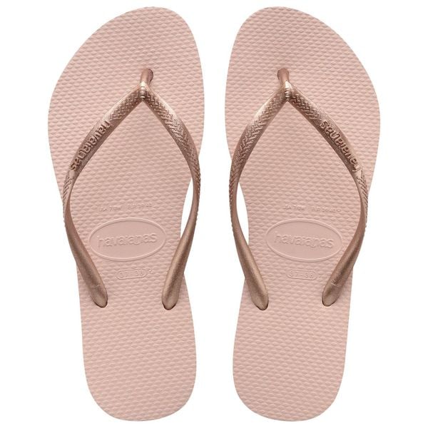 Klapki Havaianas Model 4000030 Kolor Brąz. Brązowe klapki damskie Havaianas, bez wzorów, z gumy, bez obcasa. Za 106.00 zł.