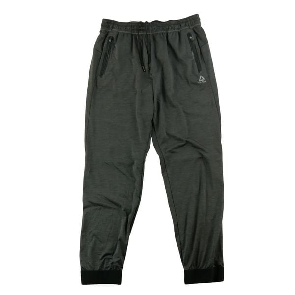Second life - Spodnie dresowe męskie Reebok do treningu - Stan dobry. Szare spodnie sportowe męskie Reebok, z dresówki. Za 63.86 zł.