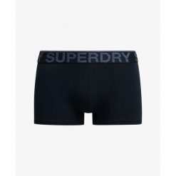 Bokserki z bawełny organicznej Superdry (x3). Niebieskie bokserki męskie Superdry., bez wzorów, z bawełny. W wyprzedaży za 152.40 zł.