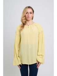 Marks & Spencer Bluzka w kolorze żółtym rozmiar: 36. Żółte bluzki damskie Marks & Spencer, bez wzorów, z wiskozy, bez kołnierzyka, bez ramiączek. Za 134.95 zł.