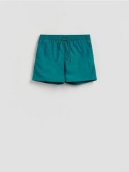 Gładkie szorty plażowe - turkusowy. Niebieskie szorty męskie Reserved, bez kołnierzyka. Za 79.99 zł.