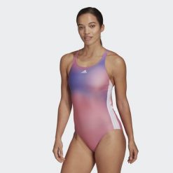 Strój kąpielowy damski Adidas Melbourne jednoczęściowy sportowy. Białe stroje jednoczęściowe damskie Adidas, xs, bez wzorów. Za 123.00 zł.