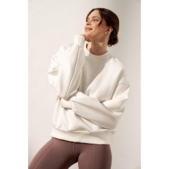 Bluza do jogi Moonholi Just Perfect oversize z bawełnianej dzianiny. Białe bluzy bez kaptura damskie MOONHOLI, s, bez wzorów, z bawełny, bez ramiączek, bez kaptura. Za 429.00 zł.