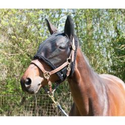 Czapka dla konia na pastwisku T de T. Czarne czapki męskie T DE T. Za 183.50 zł.