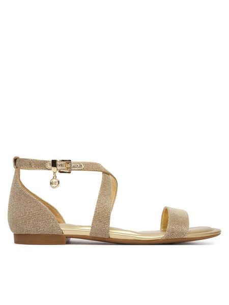 MICHAEL Michael Kors Sandały Alexa Flex Flat 40S6AXFS1D Złoty. Żółte sandały damskie MICHAEL Michael Kors, bez wzorów, ze skóry, bez obcasa, na płaskiej podeszwie. Za 589.99 zł.