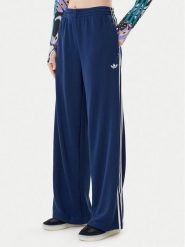 Adidas Spodnie dresowe adicolor Firebird JV7524 Granatowy Regular Fit. Niebieskie spodnie dresowe damskie Adidas, xs, bez wzorów, z dresówki. Za 279.99 zł.