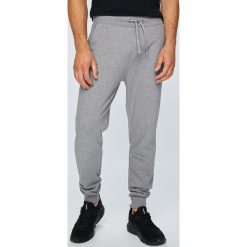 Calvin Klein Jeans - Spodnie. Szare spodnie materiałowe męskie Calvin Klein Jeans, bez wzorów, z bawełny, casualowe. W wyprzedaży za 319.90 zł.