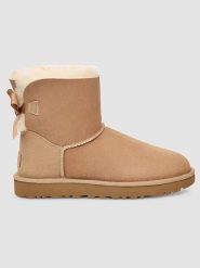 UGG Skórzane botki "Mini Bailey Bow II" w kolorze beżowym rozmiar: 36. Brązowe botki damskie Ugg, ze skóry, bez obcasa, bez zapięcia. Za 571.03 zł.