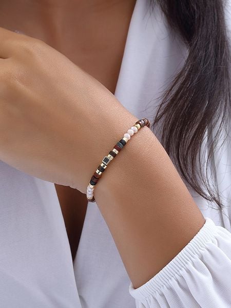 Luja Bijoux Pozłacana bransoletka z syntetycznymi perłami rozmiar: onesize. Brązowe bransoletki damskie Luja Bijoux, pozłacane. Za 66.00 zł.