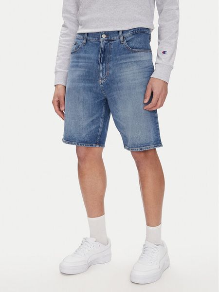 Tommy Jeans Szorty jeansowe Isaac DM0DM20952 Niebieski Relaxed Fit. Niebieskie szorty męskie Tommy Jeans, z bawełny, bez kołnierzyka. Za 169.99 zł.