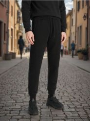 Spodnie dresowe jogger - czarny. Czarne spodnie sportowe męskie Sinsay, z bawełny. Za 49.99 zł.