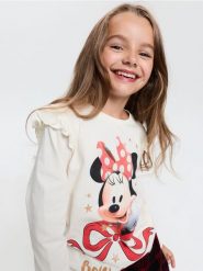 Bawełniana koszulka z długim rękawem z nadrukiem Minnie Mouse - kremowy. Białe koszulki dziewczęce Sinsay, l, bez wzorów, z bawełny, bez ramiączek. Za 15.99 zł.