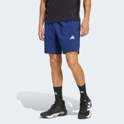 Spodenki fitness męskie ADIDAS. Niebieskie szorty sportowe męskie Adidas, m, ze skóry, na fitness i siłownię. Za 129.99 zł.