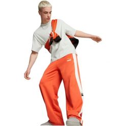 Spodnie Puma T7 Forward History Track Pant Pt Fall Fo, Mężczyźni. Brązowe spodnie materiałowe męskie Puma, bez wzorów, z poliesteru. W wyprzedaży za 290.00 zł.
