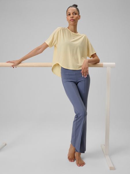 4F Koszulka do jogi regular szybkoschnąca damska - żółta L. Żółte bluzki sportowe damskie 4f, l, z dzianiny, bez kołnierzyka, bez ramiączek. Za 129.99 zł.