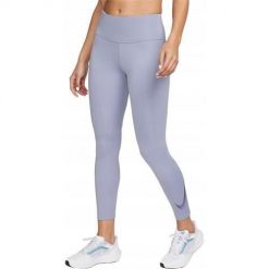 Spodnie treningowe damskie Nike DX0948519. Niebieskie spodnie sportowe damskie Nike, z materiału, na fitness i siłownię. Za 269.99 zł.