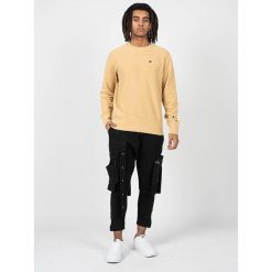 Bluza trekking męska. Żółte bluzy bez kaptura męskie CHAMPION, m, z bawełny. Za 208.00 zł.