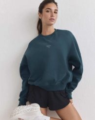Damska bluza biegowa oddychająca, odprowadzająca wilgoć Le Run lagunowa. Zielone bluzy z kapturem damskie Aim'n, s, z bawełny. Za 387.00 zł.
