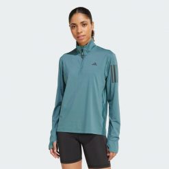 Kurtka Own the Run Half-Zip. Niebieskie kurtki do biegania damskie Adidas, xs, bez wzorów, z materiału, bez kaptura. W wyprzedaży za 164.25 zł.