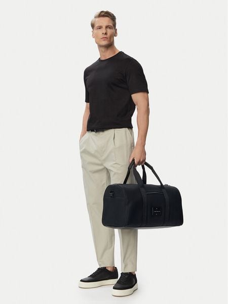 Tommy Hilfiger Torba weekendowa Th Foundation Duffle AM0AM14441 Czarny. Czarne torebki klasyczne damskie Tommy Hilfiger, bez wzorów, bez dodatków. Za 649.99 zł.