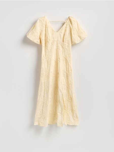 Bawełniana sukienka z haftem - jasnożółty. Żółte sukienki damskie Reserved, l, bez wzorów, z bawełny, bez kołnierzyka, bez ramiączek. Za 249.99 zł.
