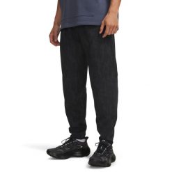 UA Unstoppable Fleece Spodnie Męskie Czarne. Czarne spodnie materiałowe męskie Under Armour, bez wzorów, z bawełny. Za 574.99 zł.
