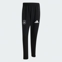 Spodnie Niemcy Tiro Travel. Czarne spodnie sportowe męskie Adidas, z dresówki. Za 329.00 zł.