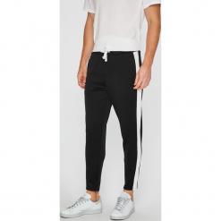 Jack & Jones - Spodnie Vega. Czarne spodnie materiałowe męskie Jack & Jones, bez wzorów, z dzianiny, casualowe. W wyprzedaży za 89.90 zł.