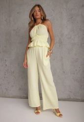 Żółty Letni Komplet z Bawełny Spodnie Wide Leg i Bluzka Halter z Wiązaniem Apomeda. Żółte spodnie materiałowe damskie Renee, bez wzorów, z bawełny, casualowe. Za 169.99 zł.