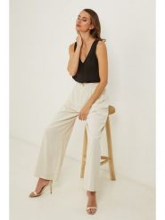 Fleur de Lin Bluzka w kolorze czarnym rozmiar: S. Czarne bluzki damskie Fleur de Lin, s, bez wzorów, ze lnu, bez kołnierzyka, bez ramiączek. Za 126.75 zł.