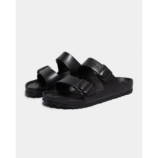 Klapki damskie Birkenstock Arizona W Eva. Czarne klapki damskie Birkenstock, bez wzorów, z materiału, bez obcasa. Za 189.00 zł.