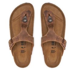 Japonki Birkenstock. Brązowe klapki damskie Birkenstock, bez wzorów, bez obcasa. Za 485.99 zł.