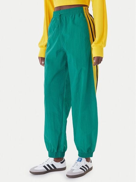 Adidas Spodnie dresowe Sport Santiago KD2971 Zielony Loose Fit. Zielone spodnie dresowe damskie Adidas, l, bez wzorów, z dresówki. Za 255.99 zł.