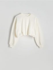 Krótka bluza ze ściągaczem - złamana biel. Bluzy bez kaptura damskie Reserved, l, z bawełny. W wyprzedaży za 49.99 zł.