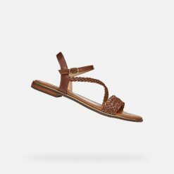 Sandały GEOX D55DQD Brązowy. Brązowe sandały damskie Geox, bez wzorów, ze skóry, bez obcasa. Za 332.99 zł.