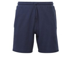Krótkie spodenki Reebok z niebieskiej bawełny. Niebieskie szorty męskie Reebok, z bawełny. W wyprzedaży za 156.45 zł.