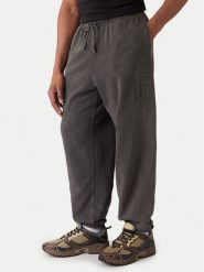 Tommy Jeans Spodnie dresowe New Classic DM0DM22360 Szary Relaxed Fit. Szare spodnie dresowe męskie Tommy Jeans, bez wzorów, z bawełny. Za 329.99 zł.