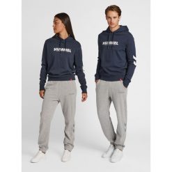 Bluza z kapturem Hummel Legacy Logo. Niebieskie bluzy sportowe damskie HUMMEL, xs, bez wzorów, bez ramiączek, z kapturem. Za 167.50 zł.