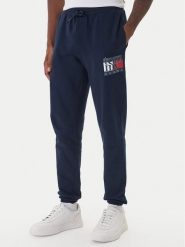Tommy Jeans Spodnie dresowe DM0DM22094 Granatowy Relaxed Fit. Niebieskie spodnie dresowe męskie Tommy Jeans, bez wzorów, z bawełny. Za 249.99 zł.