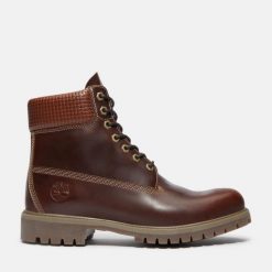 Trapery męskie TIMBERLAND Premium 6 Inch Lace Up Waterproof Boot. Brązowe buty zimowe męskie Timberland, z gumy, bez zapięcia. Za 789.99 zł.