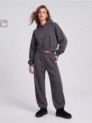 Spodnie dresowe z bawełną - szary. Szare spodnie sportowe damskie Sinsay, l, z bawełny, na fitness i siłownię. Za 39.99 zł.